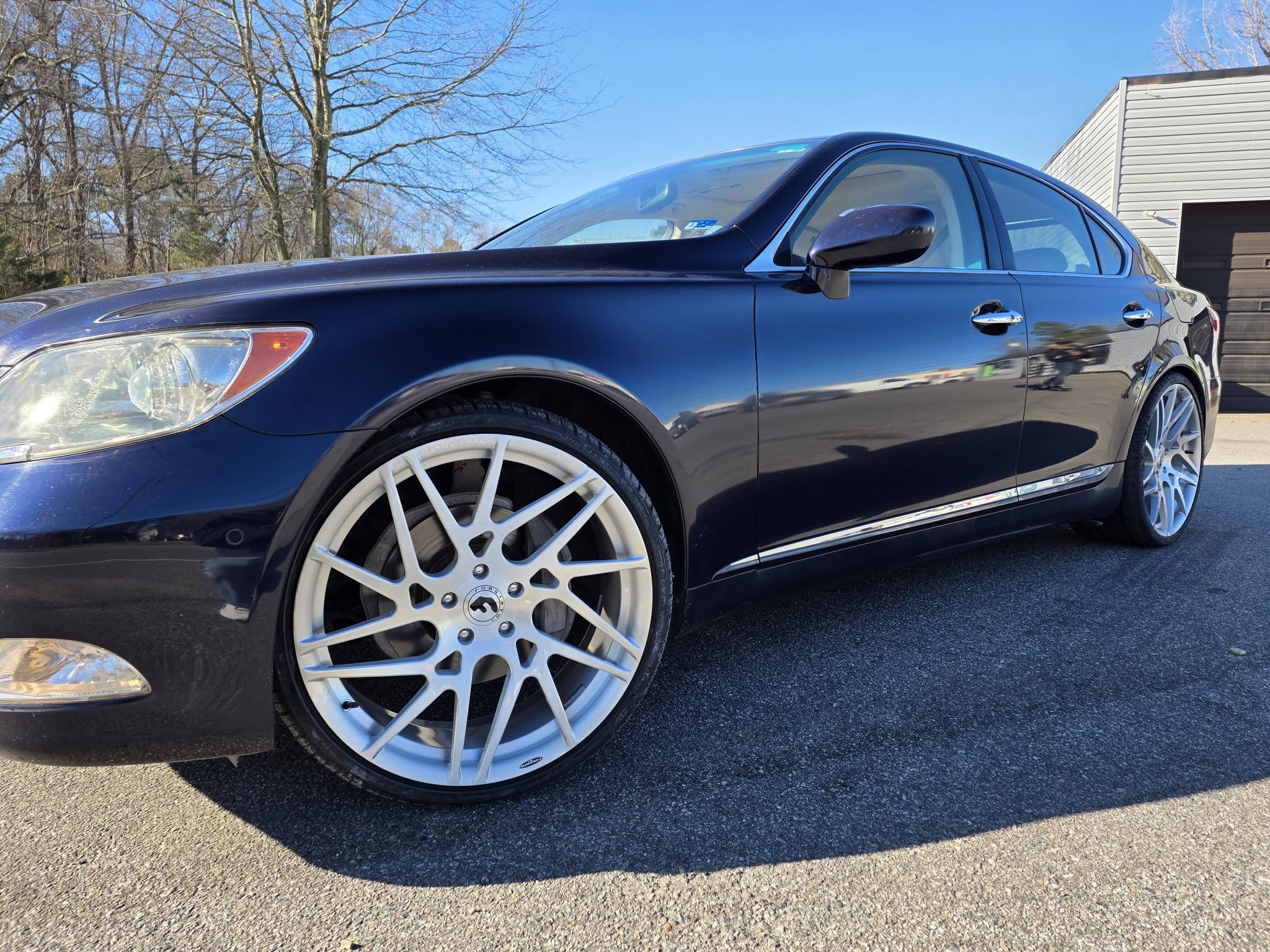 Lexus sedan with custom wheels